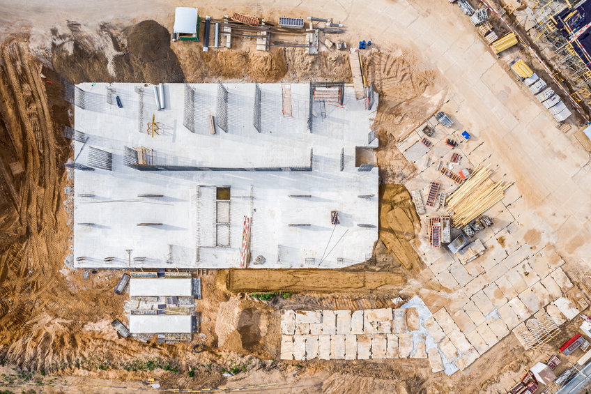 construction of concrete foundation of building. aerial top view